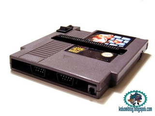 Illustration for article titled NES Cartridge Modded into NES System. Space-Time Remains Intact